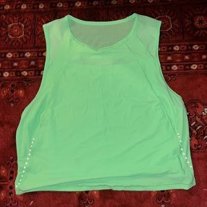 Cropped muscle tank with mesh back and cut out detail